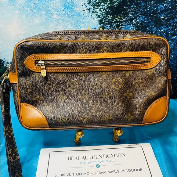 Louis Vuitton Other - Louis Vuitton Monogram Marly Dragonne Wristlet With COA in VGC